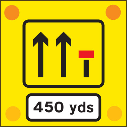 Signs used on the back of slow-moving or stationary vehicles warning of a lane closed ahead by a works vehicle. There are no cones on the road.